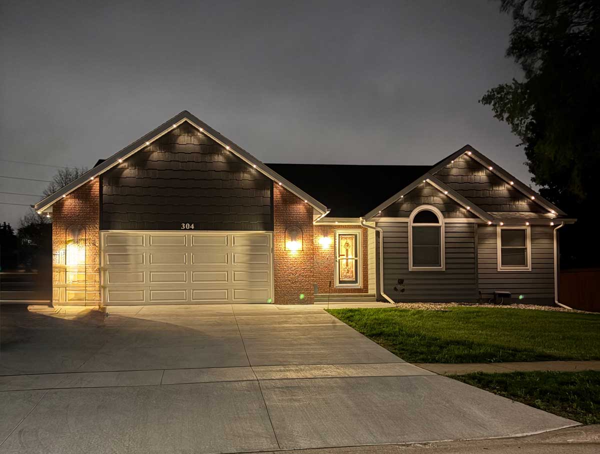 Home exterior with architectural soffit lighting