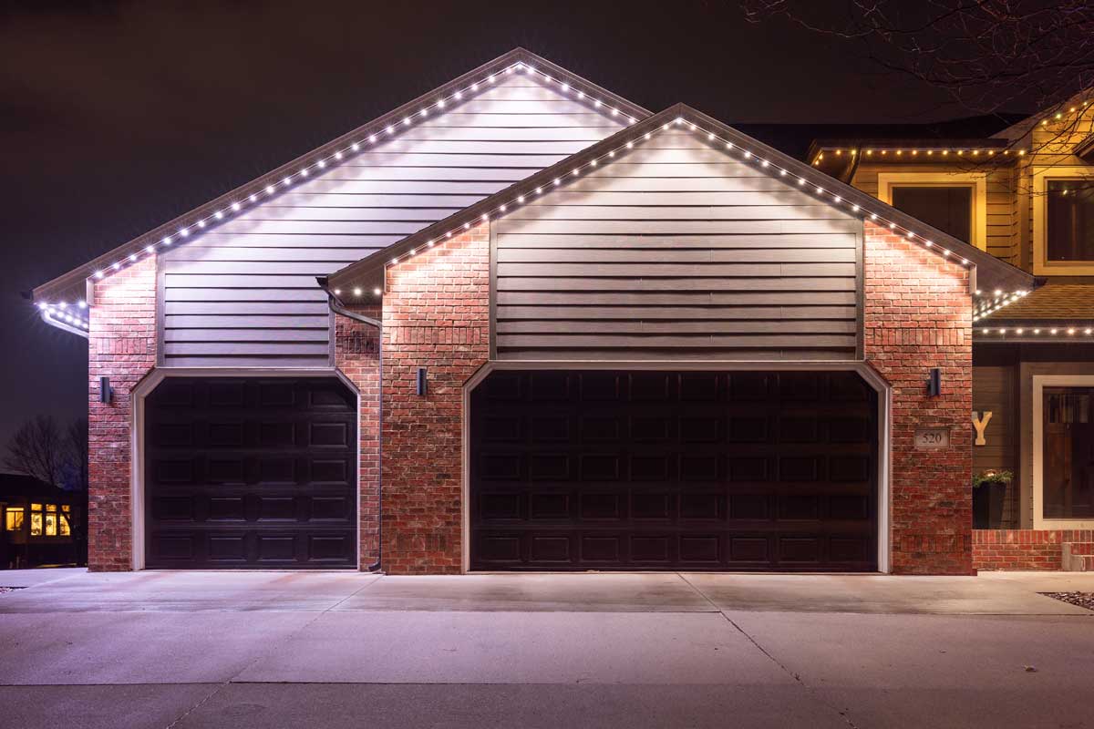 Permanent lighting along a residential roofline