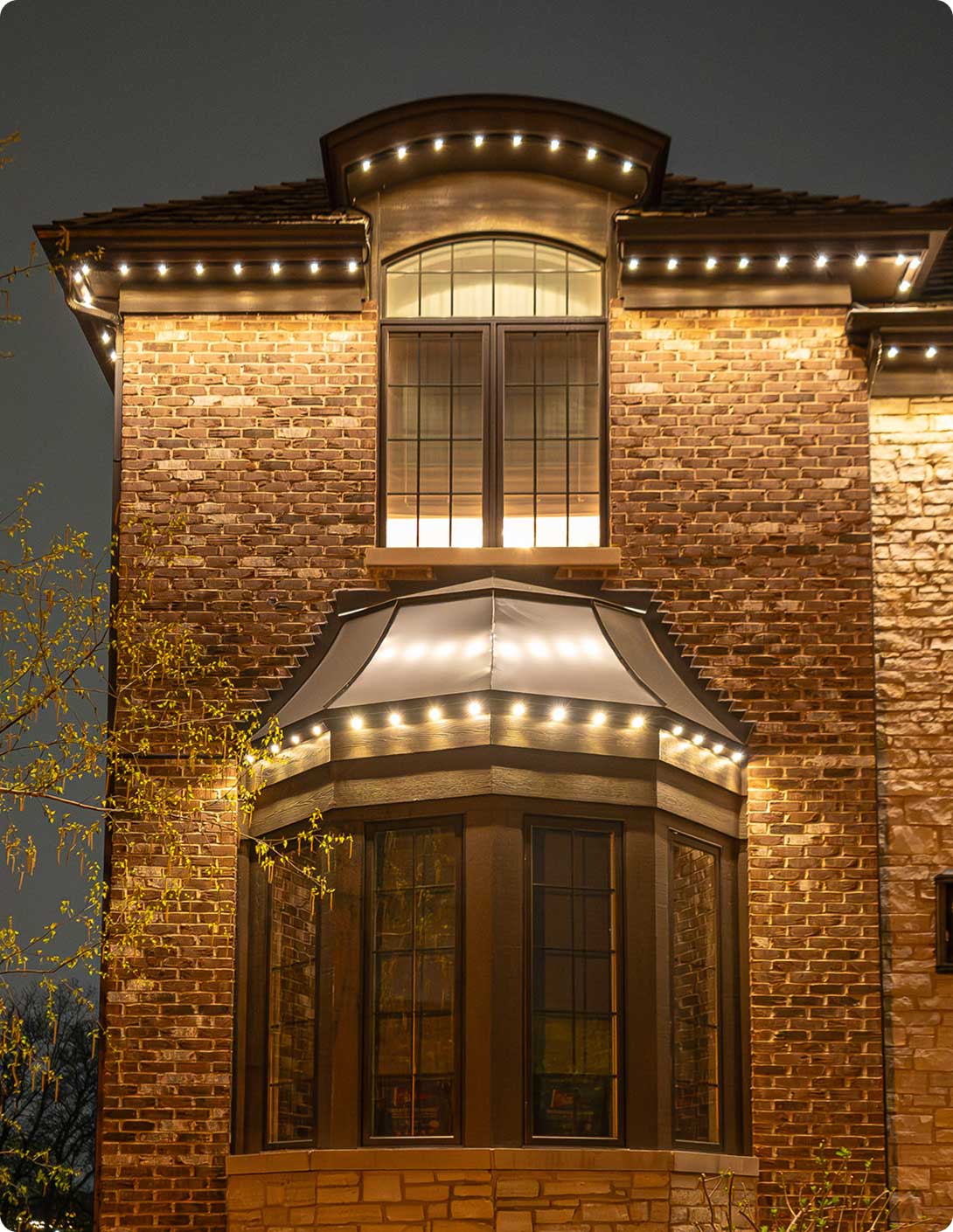 Permanent property security lighting installed on a home