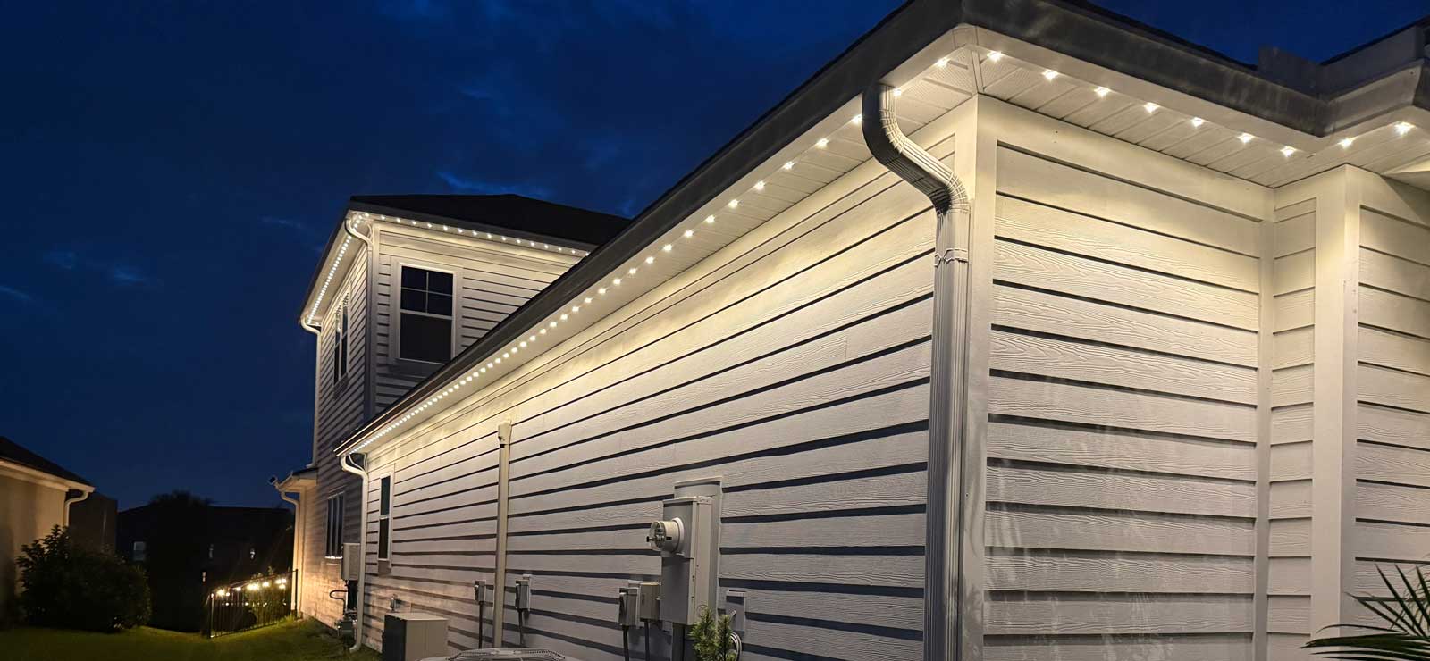 Permanent property security lighting installed on a home