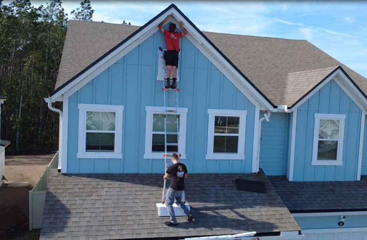 Permanent security lighting installed along a residential roofline