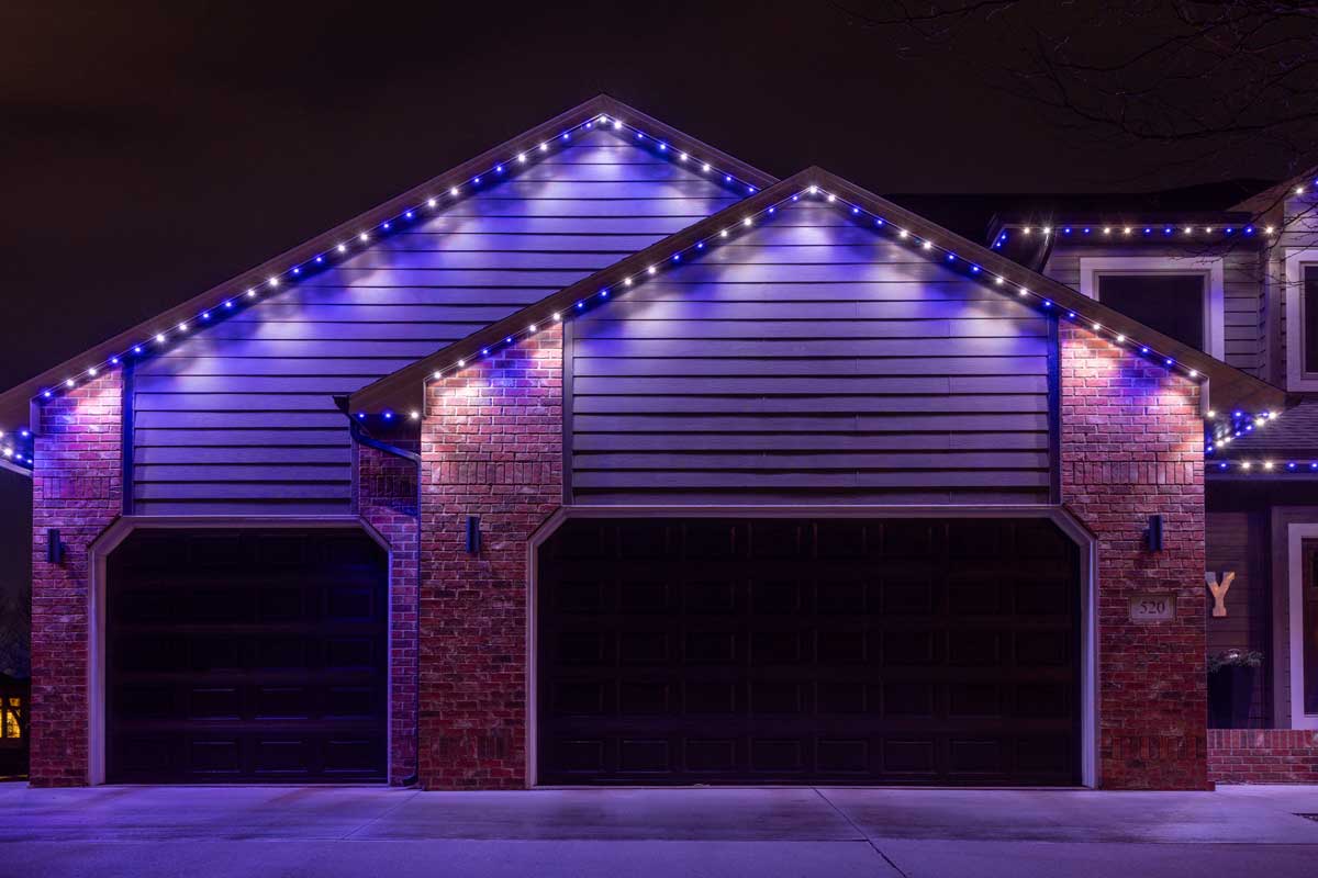 Professional security lighting illuminating a residential home