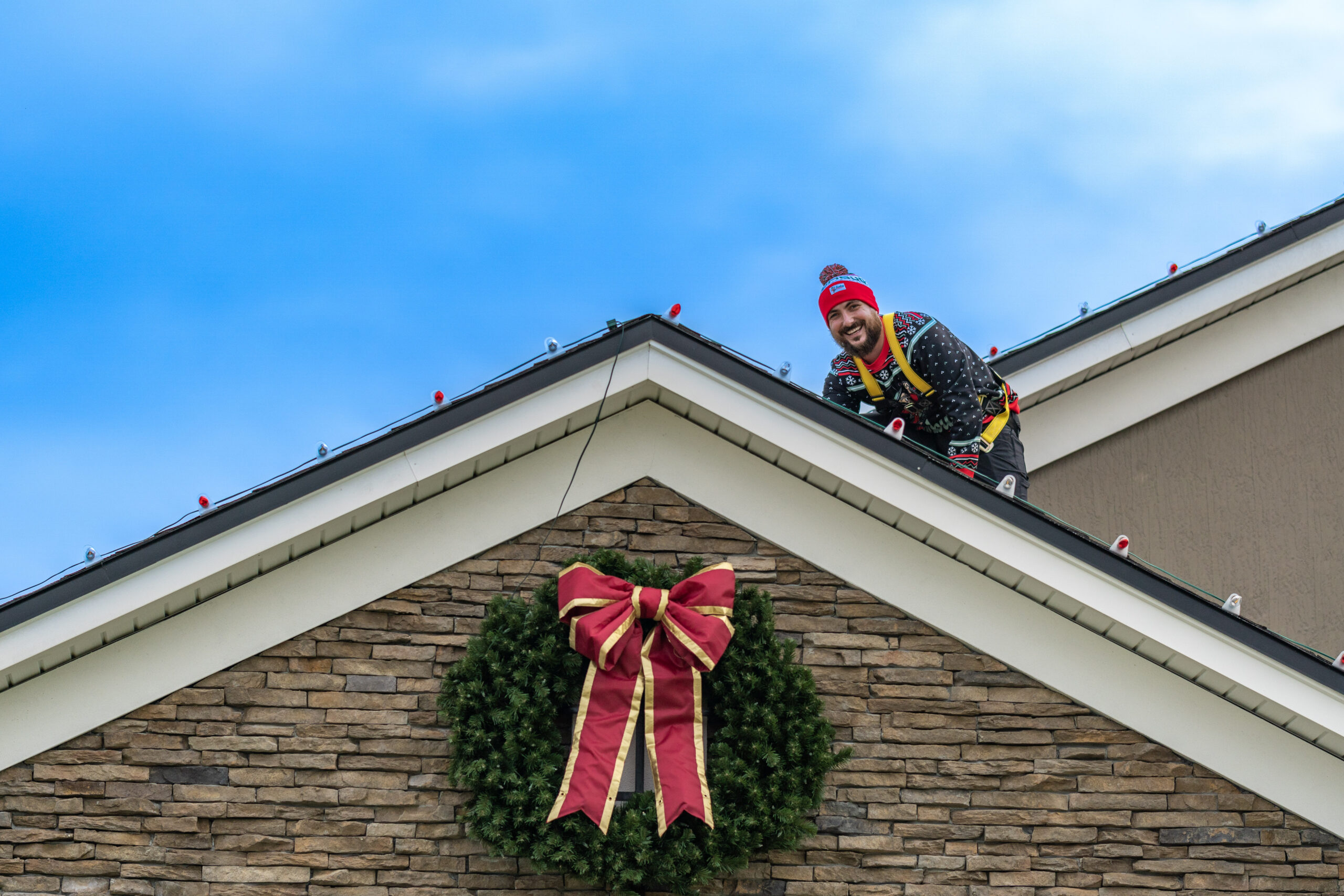 Professional holiday lighting installation by Humbug
