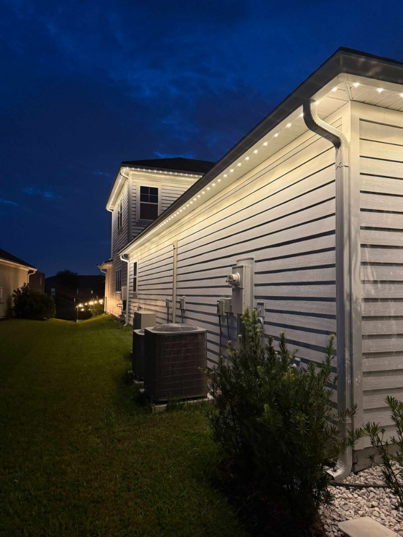 Professional security lighting illuminating a residential home